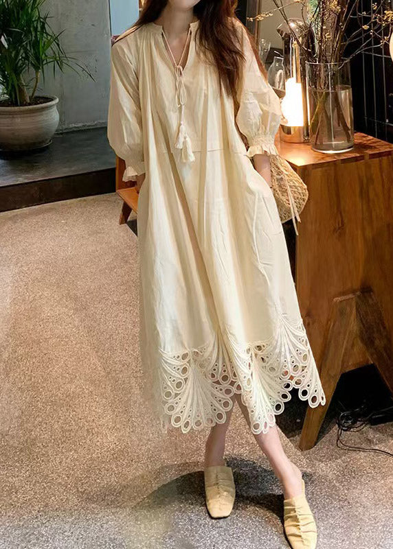 V-Neck Tassel Tie Three-Quarter Puff Sleeve Eyelet Embroidery Hem Midi Dress